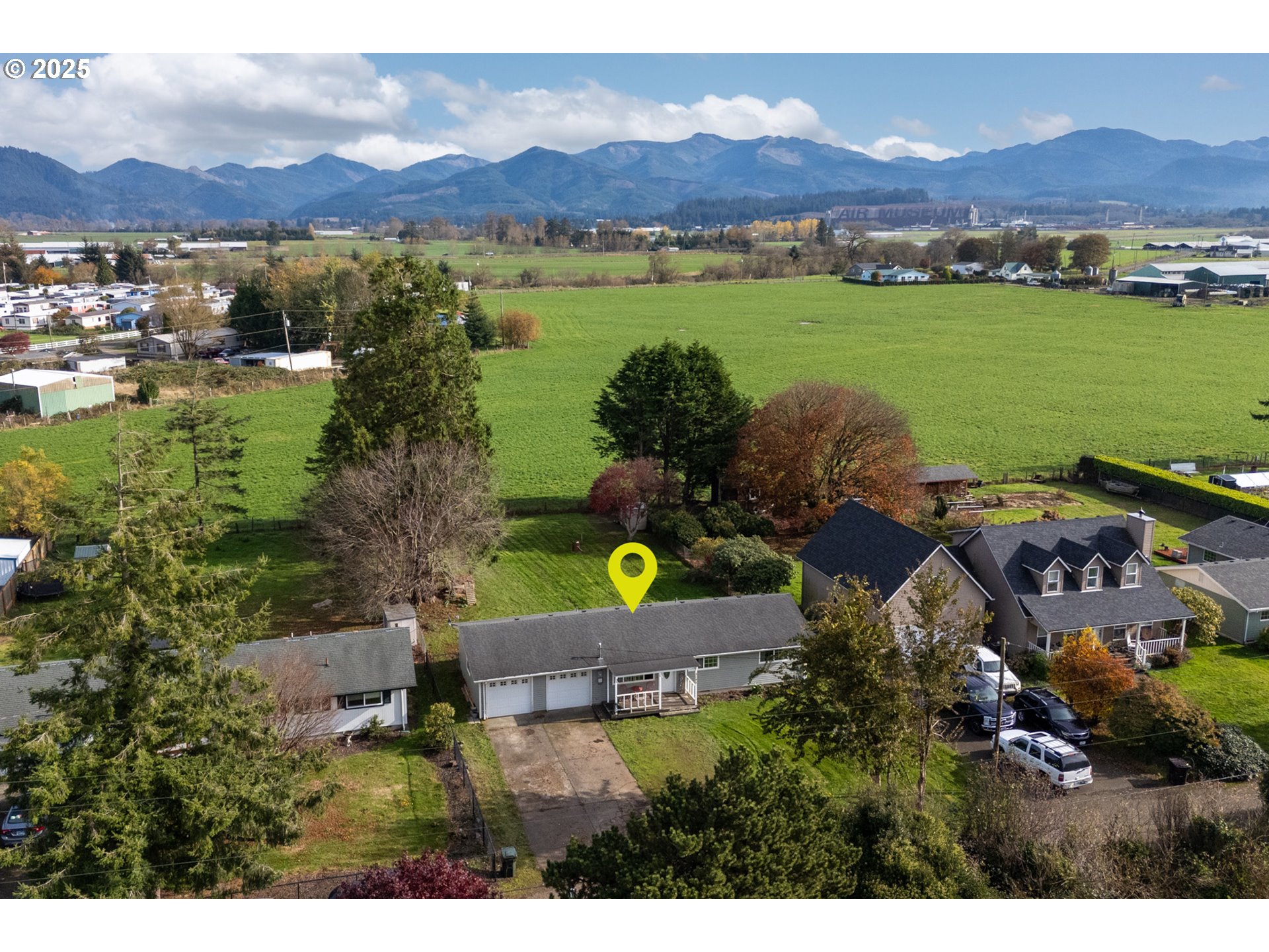 3195 Fitzpatrick Road Tillamook, OR 97141 - Photo 2 of 31 a view of a city with lake view