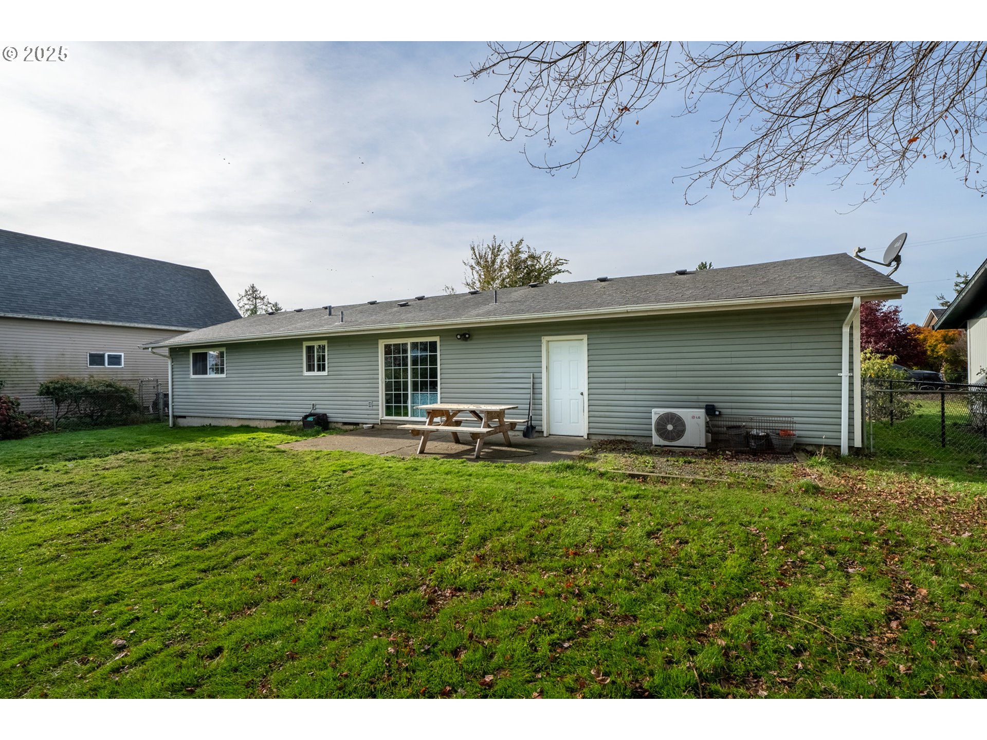 3195 Fitzpatrick Road Tillamook, OR 97141 - Photo 27 of 31 a view of a house with backyard