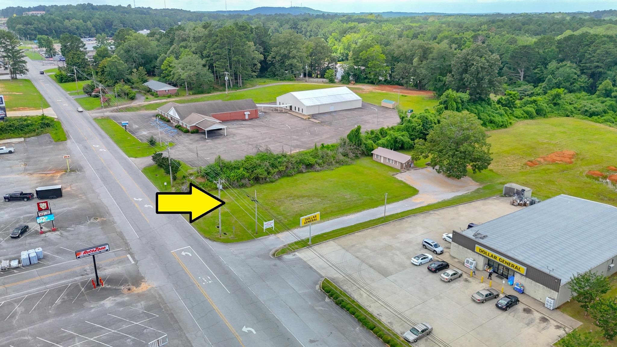 an aerial view of a house with a swimming pool