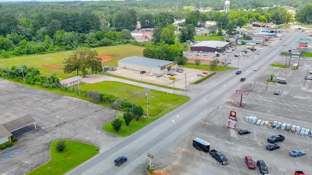 an aerial view of a house with a garden