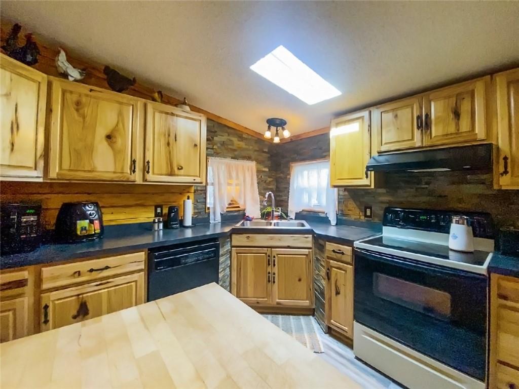 218 Salem Church Road Midland, PA 15059 - Photo 11 of 25 NICE SUNLIGHT TO MAKE THE KITCHEN BRIGHT!