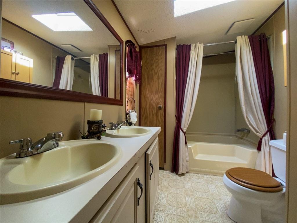 218 Salem Church Road Midland, PA 15059 - Photo 16 of 25 MASTER BATH WITH TUB AND SEPARATE SHOWER