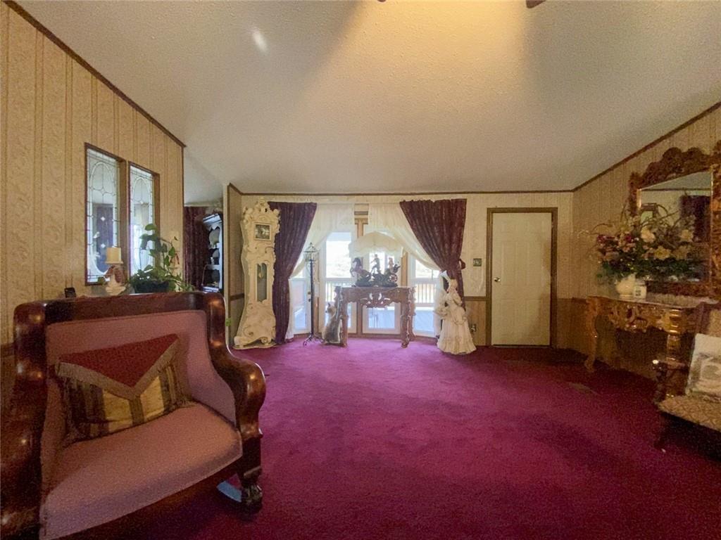 218 Salem Church Road Midland, PA 15059 - Photo 7 of 25 LARGE LIVING ROOM WITH FIRLEPLACE