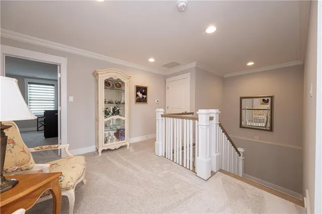 a view of a livingroom with stairs