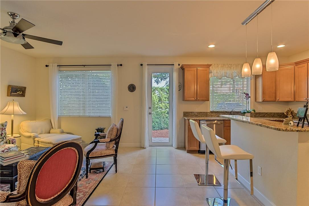 80 Northwest Alcott Circle Boca Raton, FL 33432 - Photo 12 of 51 Family room and kitchen living area