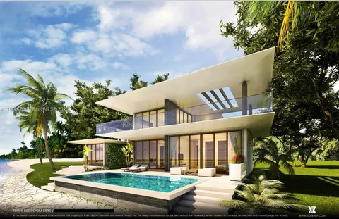 a view of a swimming pool with lawn chairs under an umbrella