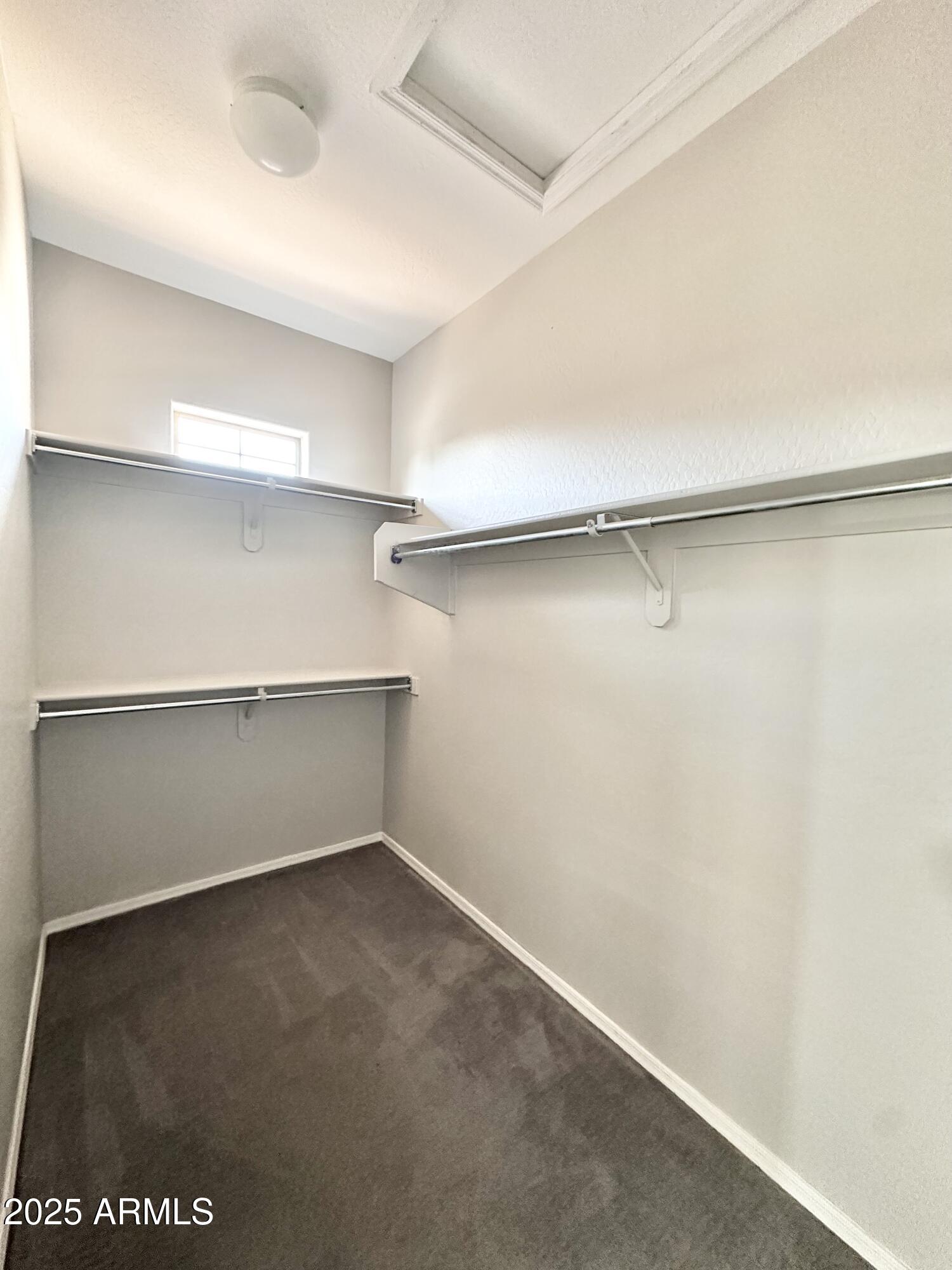 16511 West Tether Trail Surprise, AZ 85387 - Photo 53 of 88 an empty room with a empty space