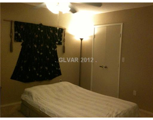 8101 West Flamingo Road, Unit 1007 Las Vegas, NV 89147 - Photo 5 of 10 Master Bedroom. Masterbedroom with walk-in closet
