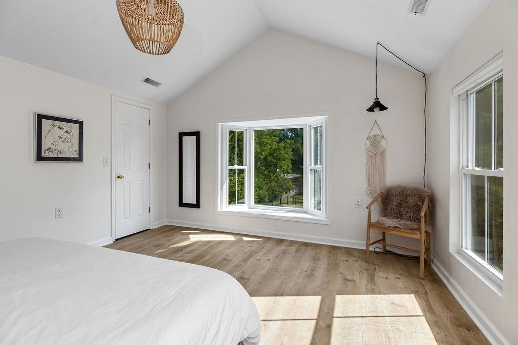 7549 Thomas Spring Road Bridgewater, VA 22812 - Photo 54 of 57 a bedroom with a large bed and a large window
