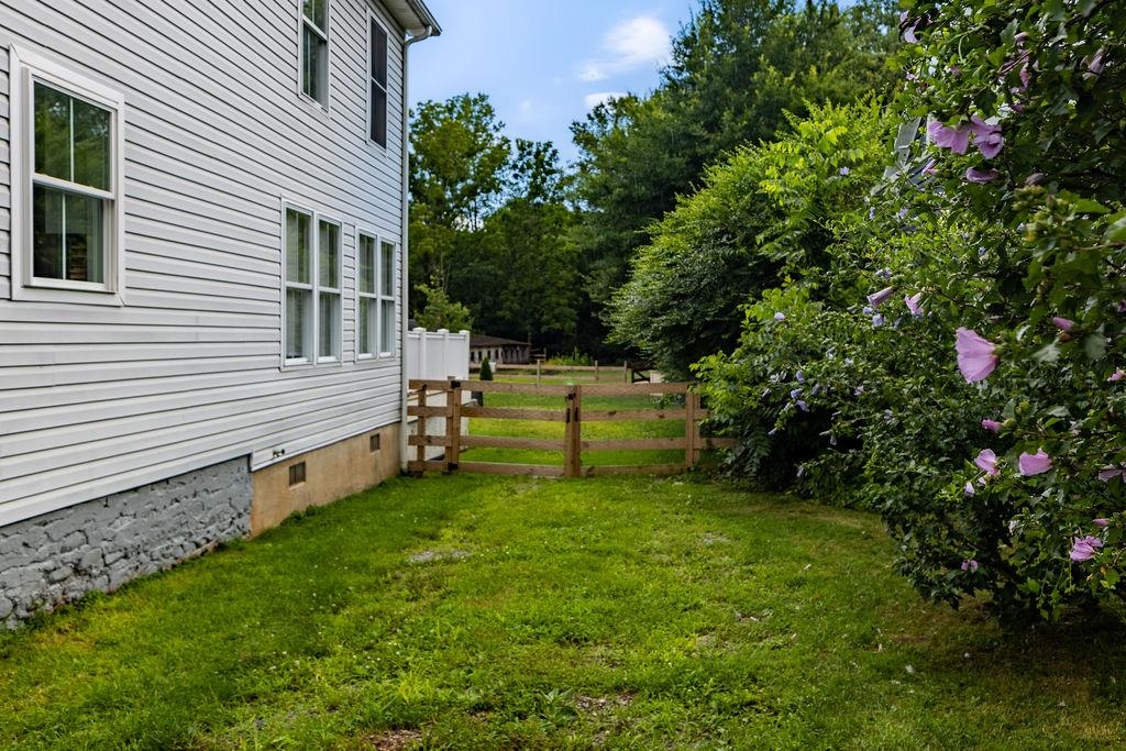 7549 Thomas Spring Road Bridgewater, VA 22812 - Photo 7 of 57 a view of a house with a backyard