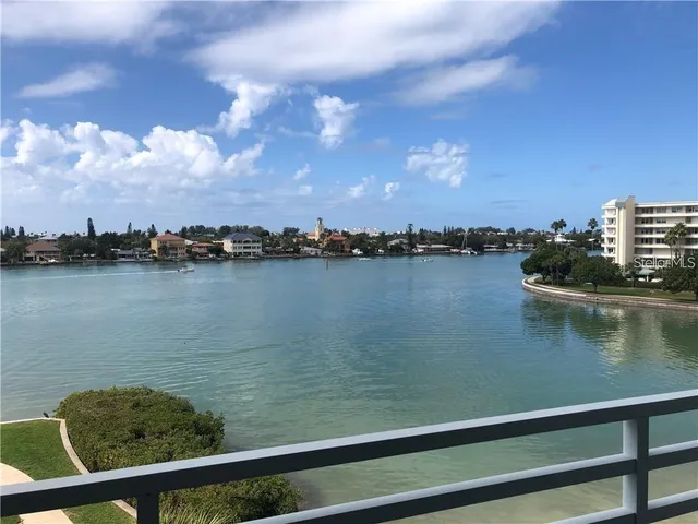 a view of a lake from a balcony