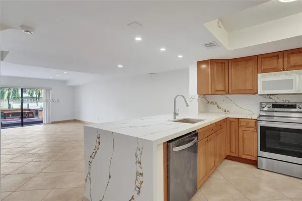 $890,000 | 2689 Northeast 165th Street, Unit 56, North Miami Beach, FL 33160