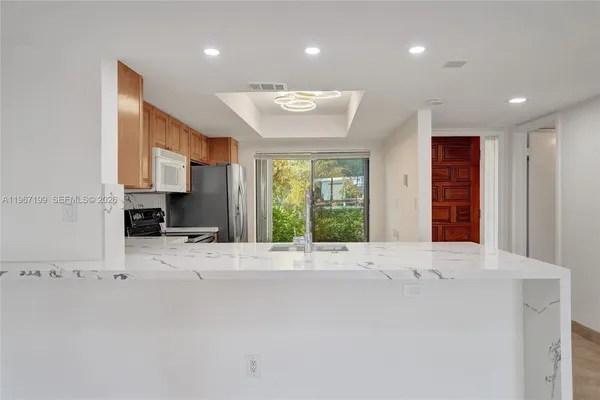 $890,000 | 2689 Northeast 165th Street, Unit 56, North Miami Beach, FL 33160