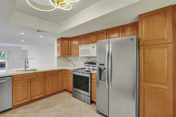 $890,000 | 2689 Northeast 165th Street, Unit 56, North Miami Beach, FL 33160