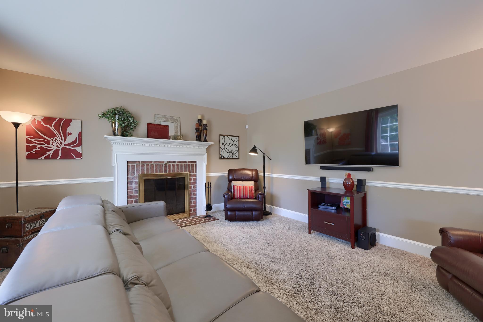 105 Hammersmith Lane Lititz, PA 17543 - Photo 11 of 49 a living room with furniture and a flat screen tv