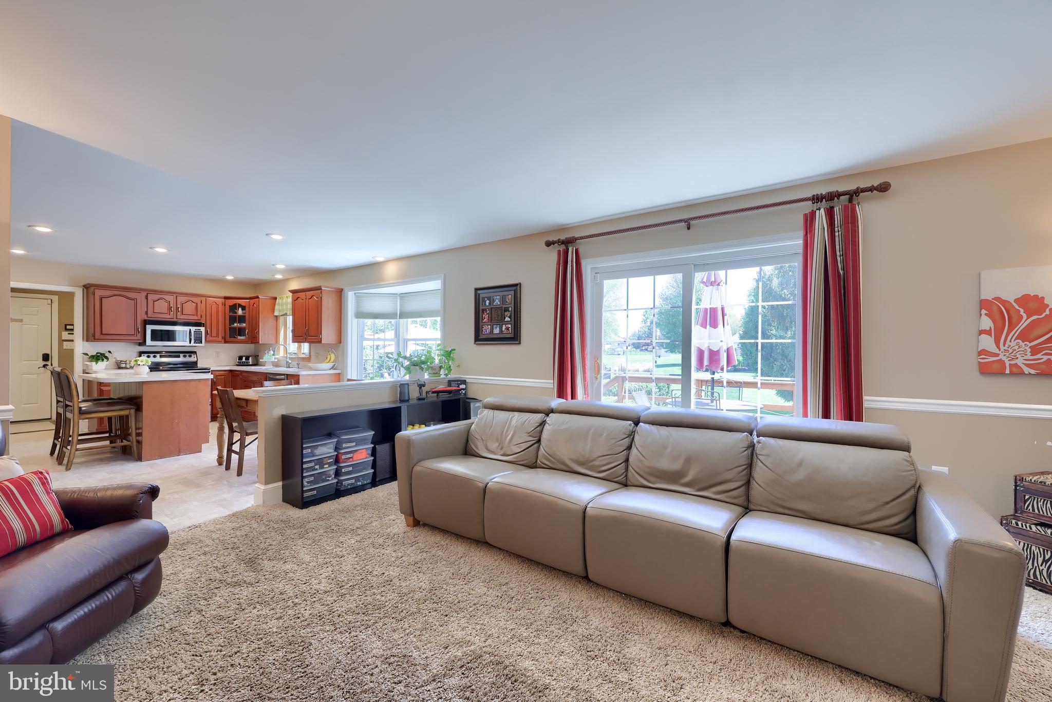 105 Hammersmith Lane Lititz, PA 17543 - Photo 13 of 49 a living room with furniture and a fireplace