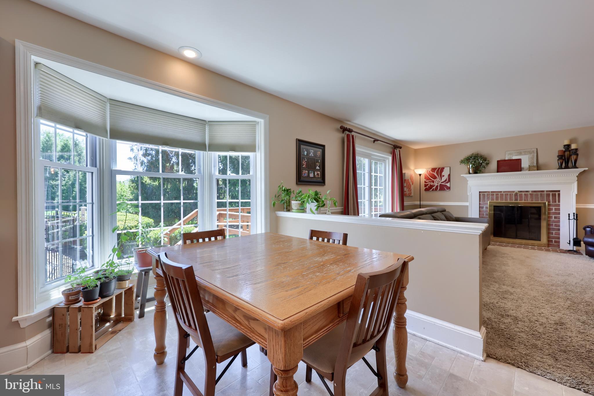 105 Hammersmith Lane Lititz, PA 17543 - Photo 15 of 49 a dining room with furniture window and wooden floor