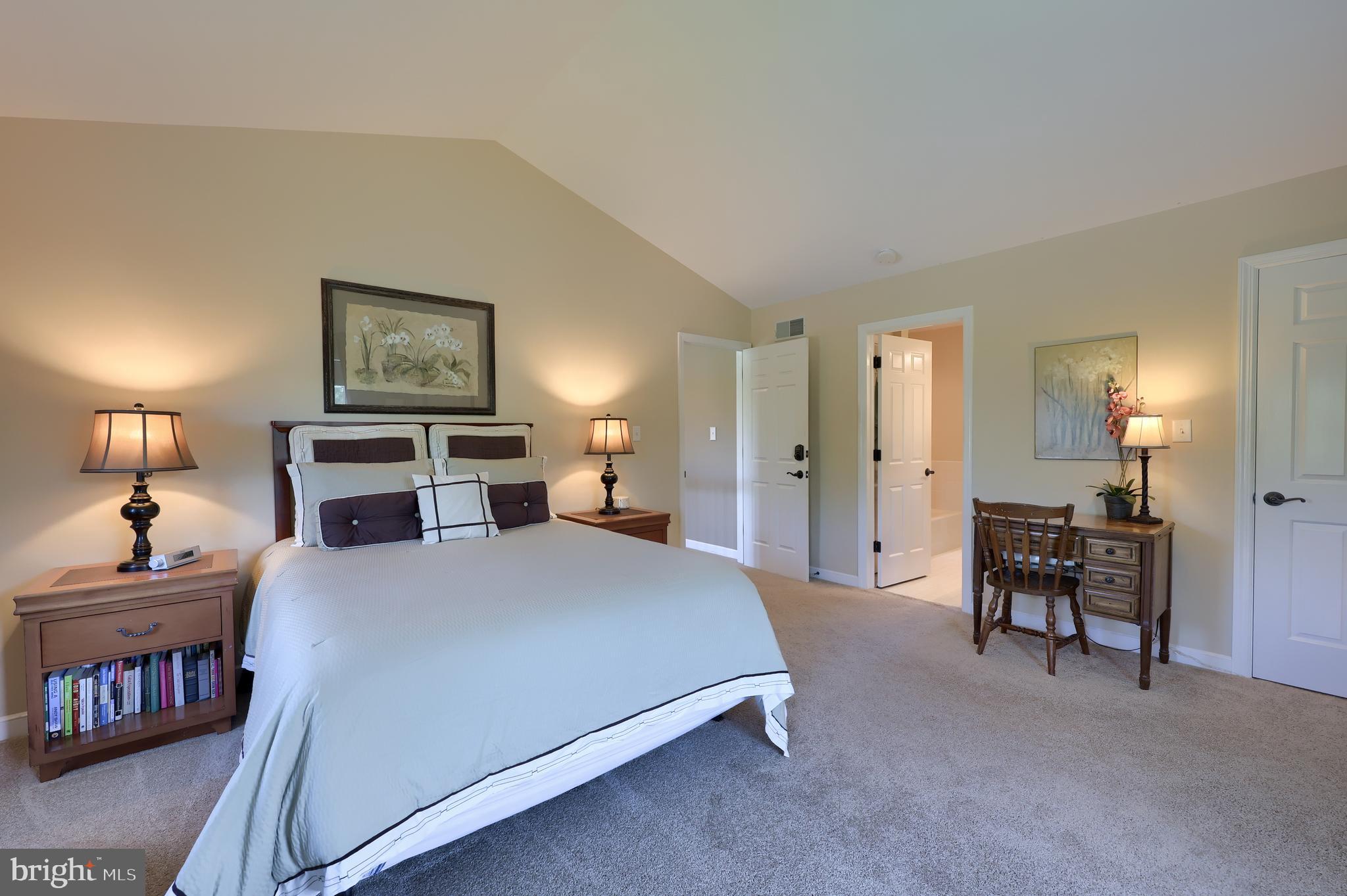 105 Hammersmith Lane Lititz, PA 17543 - Photo 26 of 49 a bedroom with a bed and a table in it