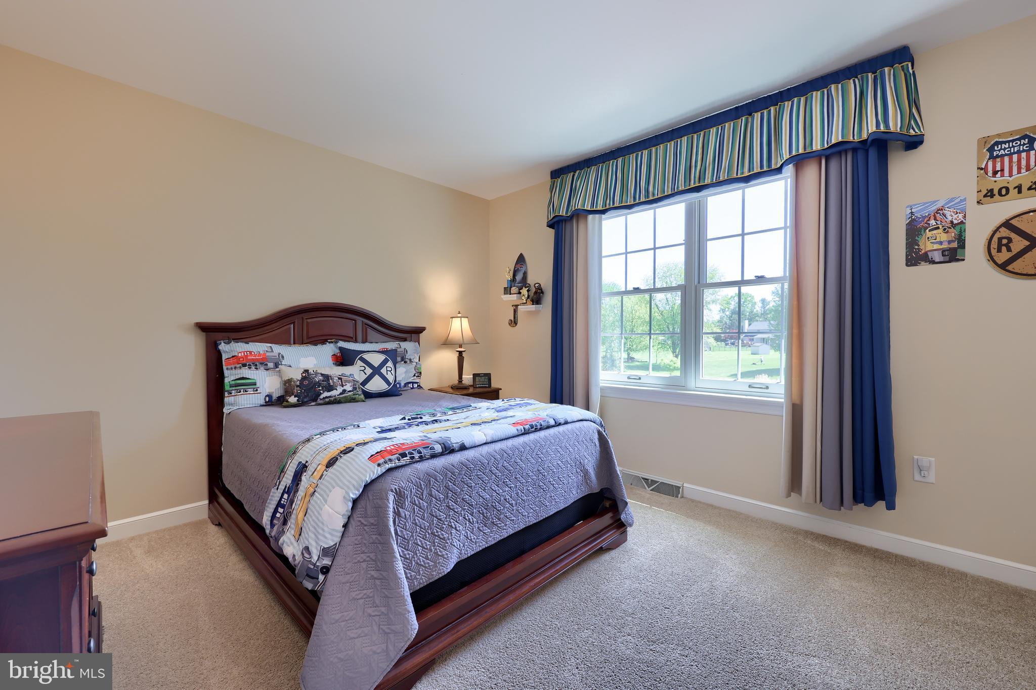 105 Hammersmith Lane Lititz, PA 17543 - Photo 32 of 49 a bedroom with a bed and a window