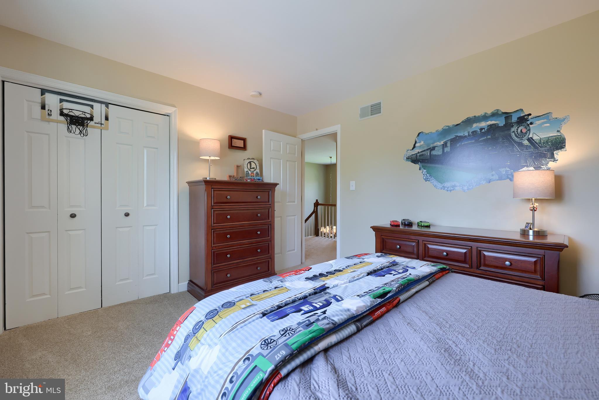 105 Hammersmith Lane Lititz, PA 17543 - Photo 33 of 49 a bedroom with a bed and a dresser in it