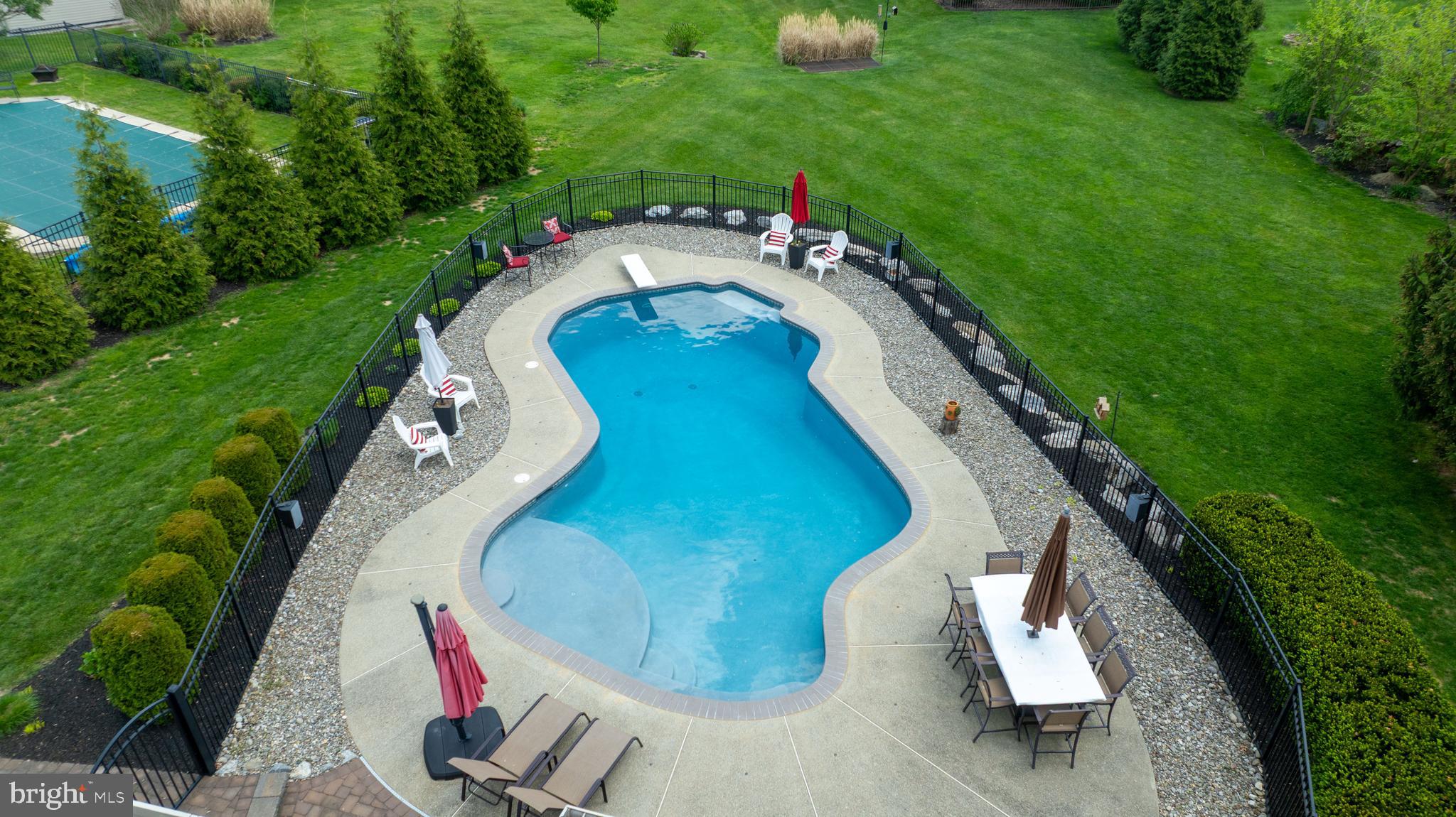 105 Hammersmith Lane Lititz, PA 17543 - Photo 42 of 49 a view of a swimming pool with a yard