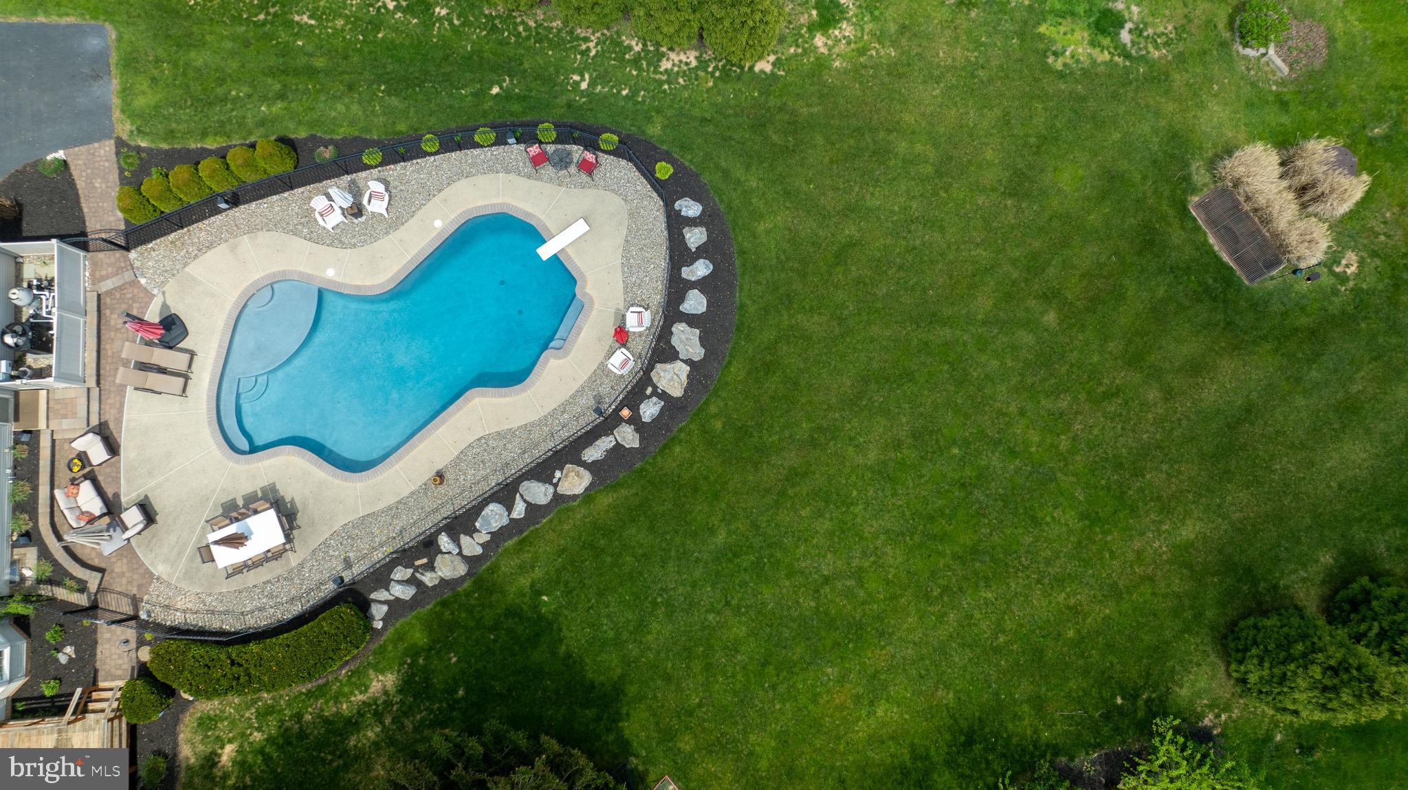 105 Hammersmith Lane Lititz, PA 17543 - Photo 43 of 49 a view of a swimming pool with outdoor seating and yard
