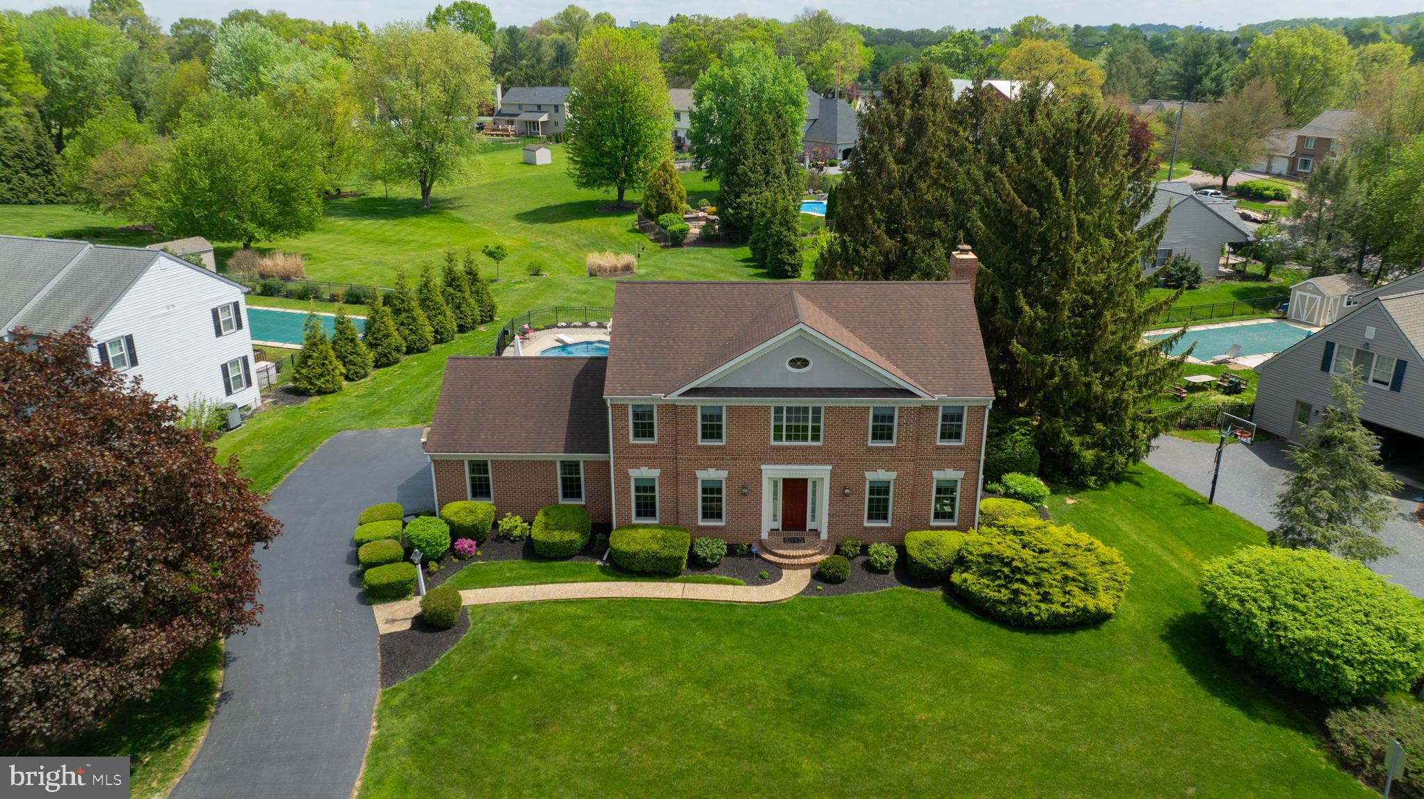 105 Hammersmith Lane Lititz, PA 17543 - Photo 45 of 49 a front view of a house with a garden