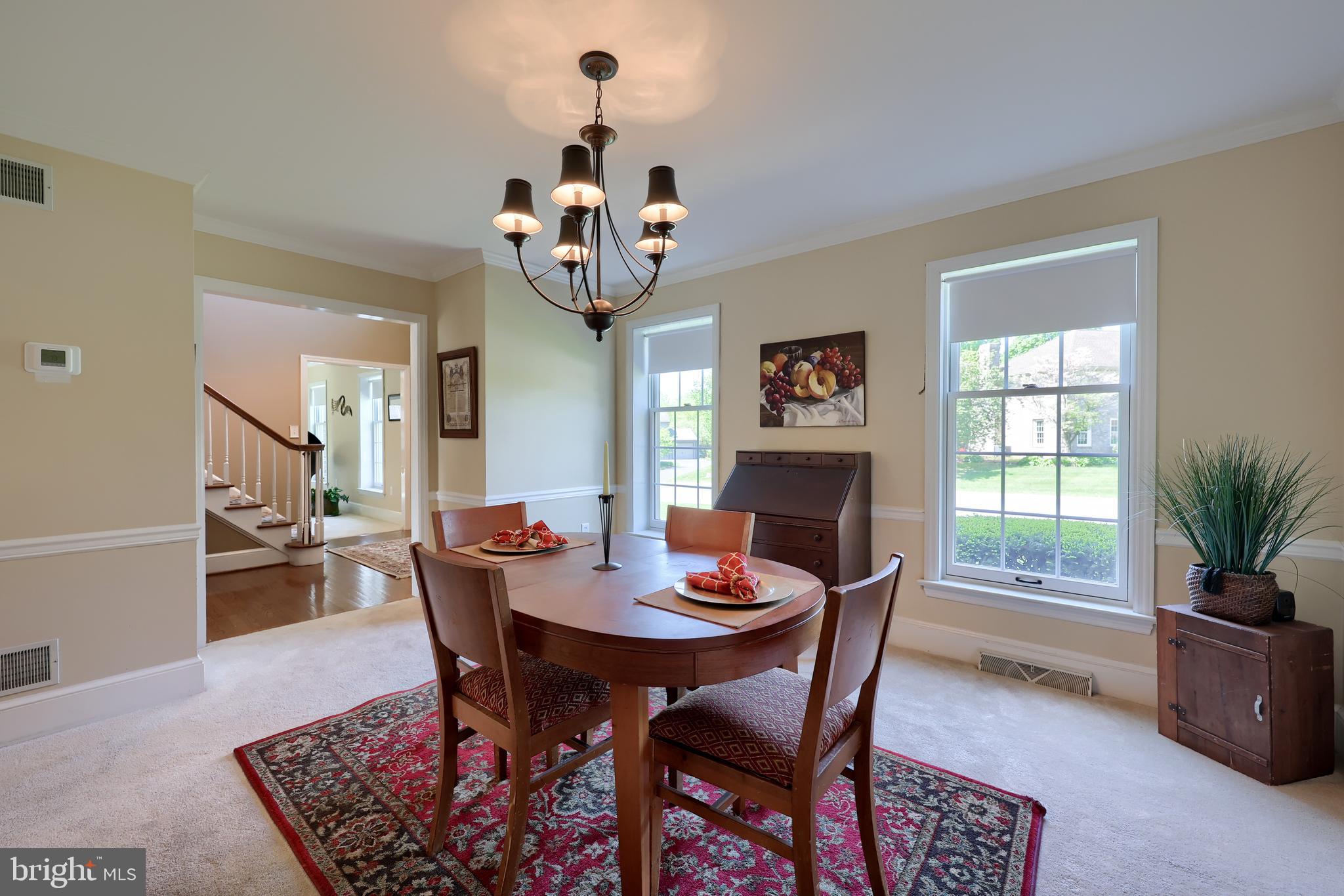 105 Hammersmith Lane Lititz, PA 17543 - Photo 8 of 49 a view of a dining room with furniture window and wooden floor