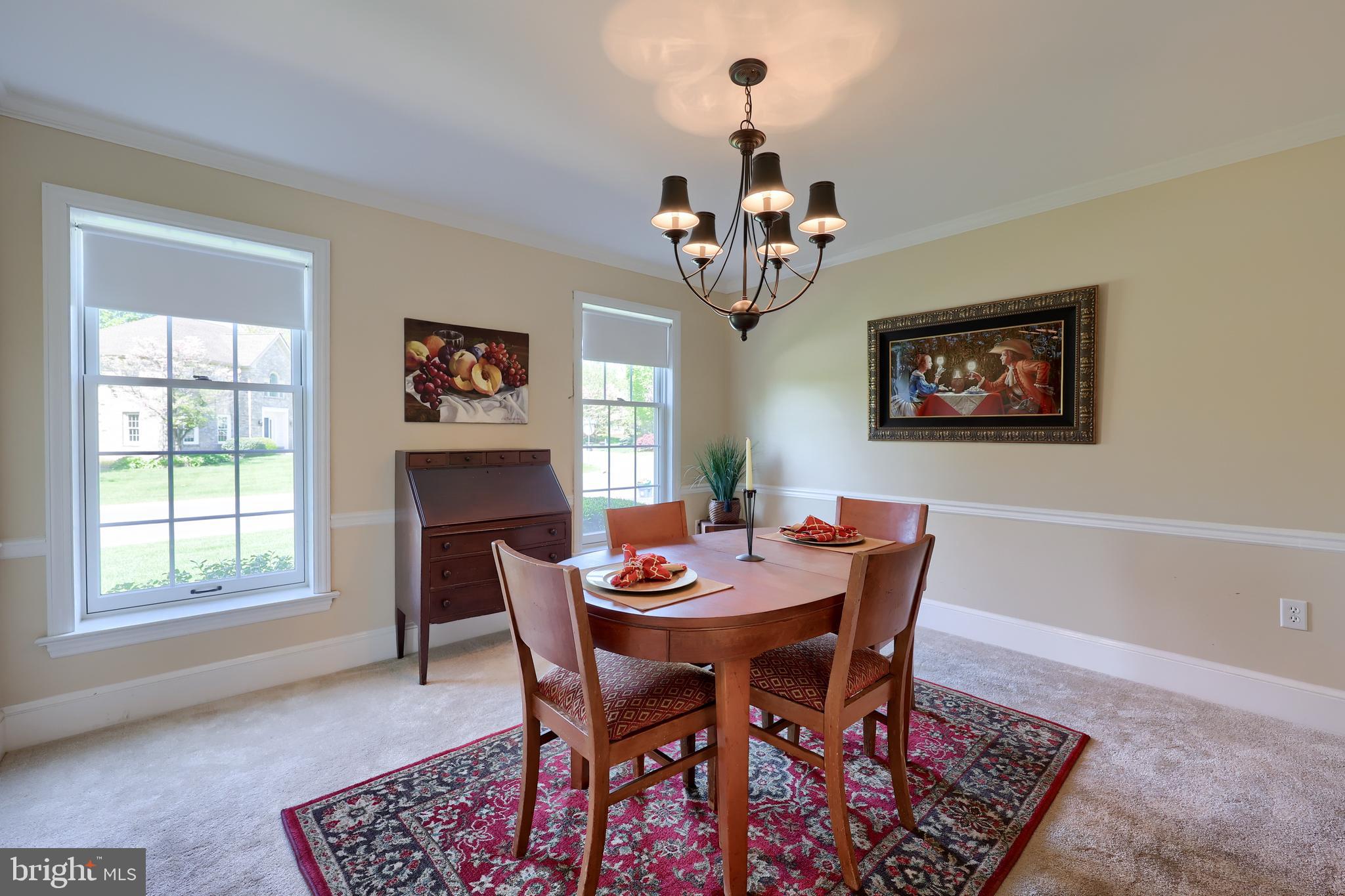 105 Hammersmith Lane Lititz, PA 17543 - Photo 9 of 49 a view of a dining room with furniture window and wooden floor
