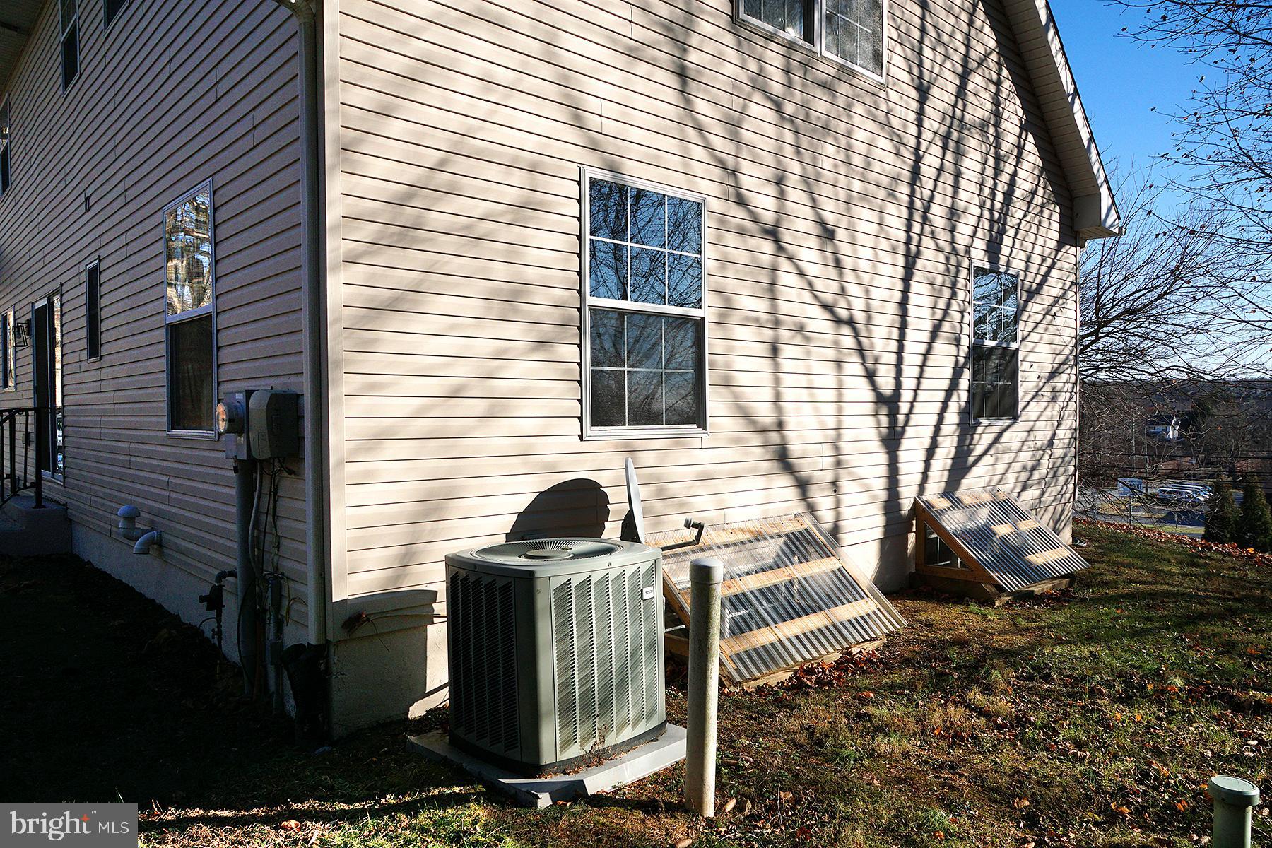 637 McCalls Ferry Road Parkesburg, PA 19365 - Photo 37 of 38 Exterior -
West Side - showing A/C condenser