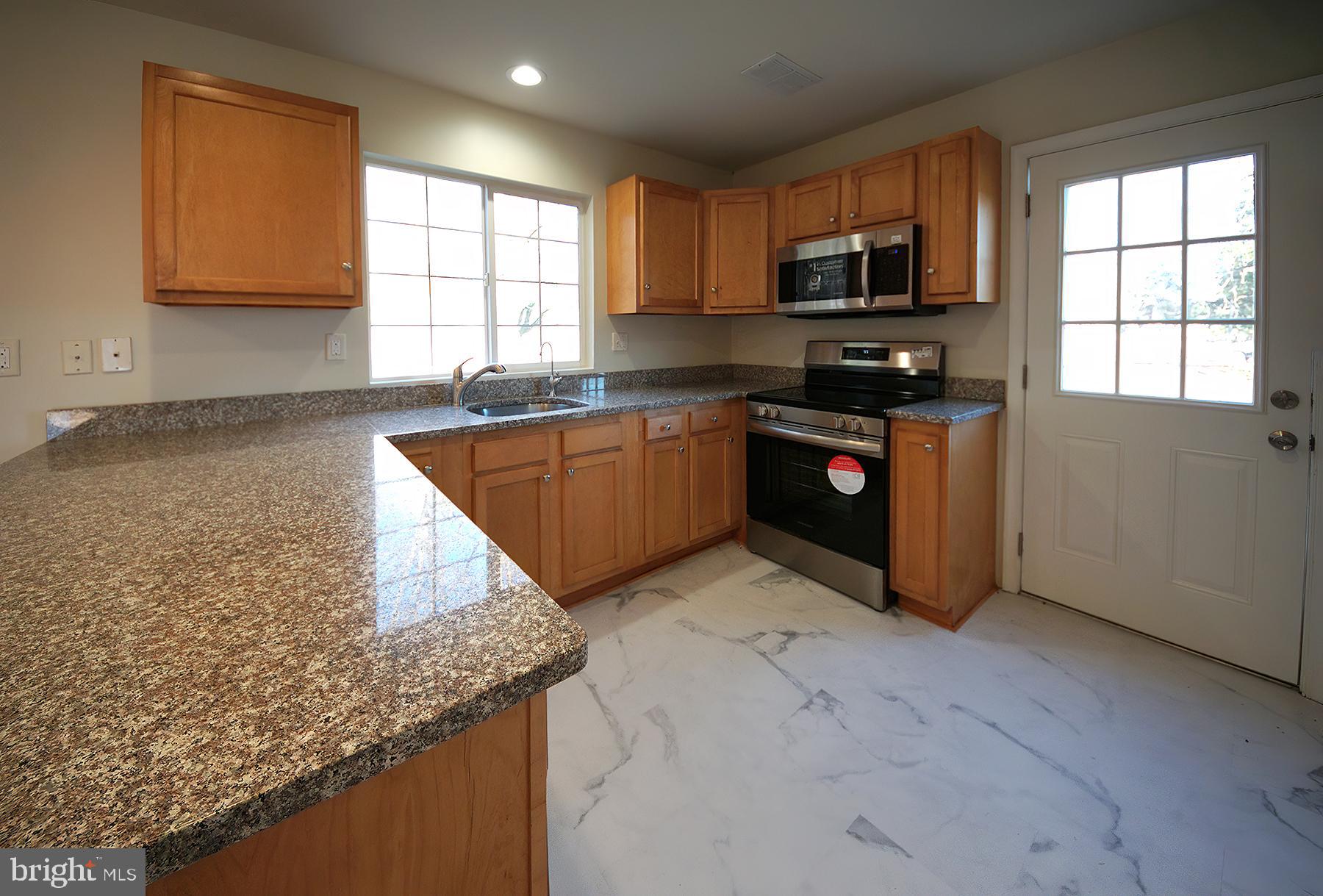 637 McCalls Ferry Road Parkesburg, PA 19365 - Photo 6 of 38 Kitchen showing new Range and Microwave