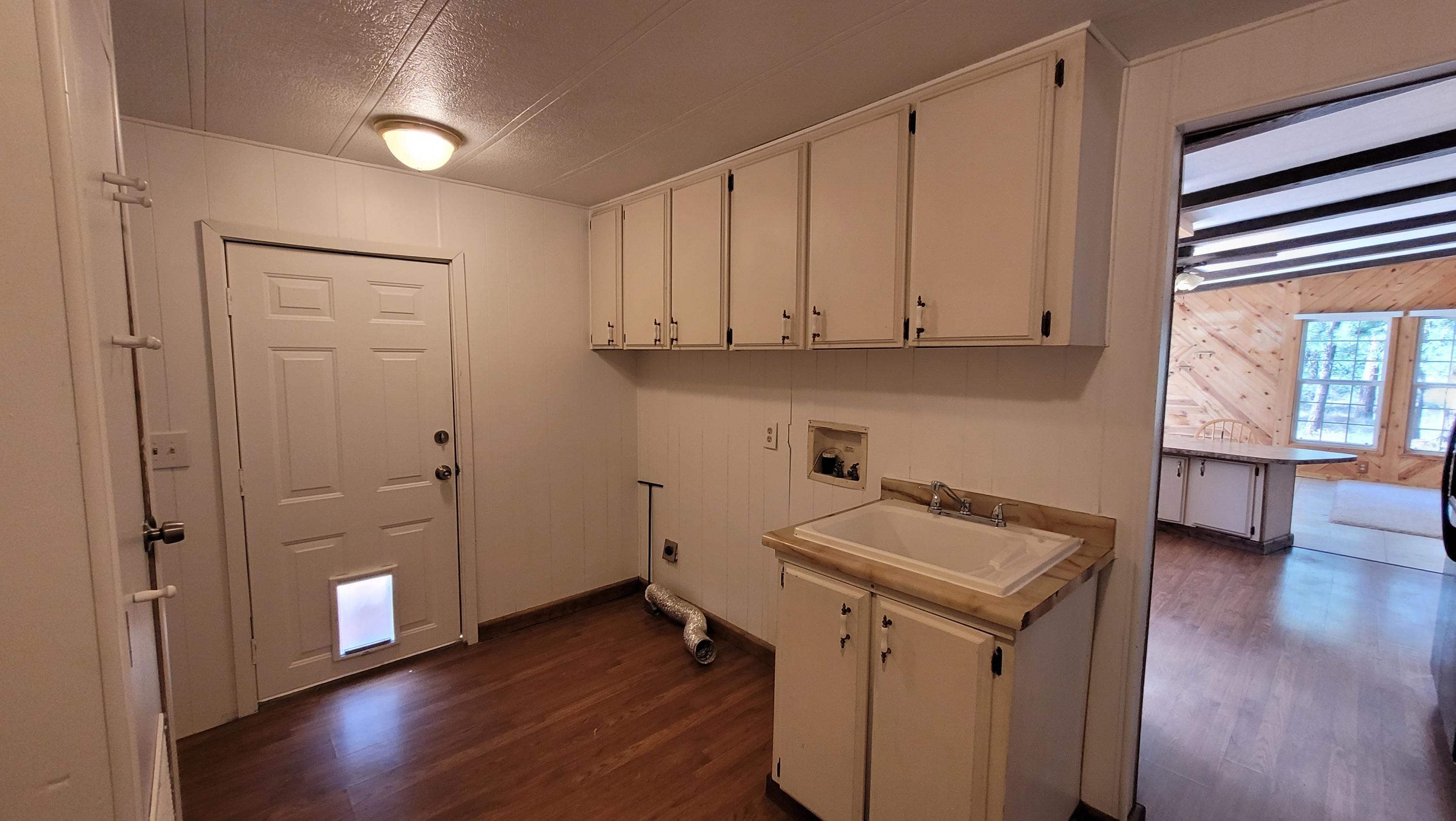 19724 Buck Canyon Road Bend, OR 97702 - Photo 32 of 38 Utility sink in oversized laundry room.