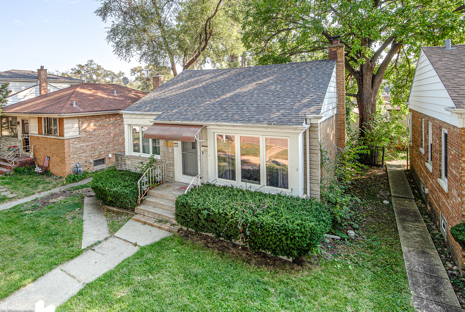 a house view with a garden space
