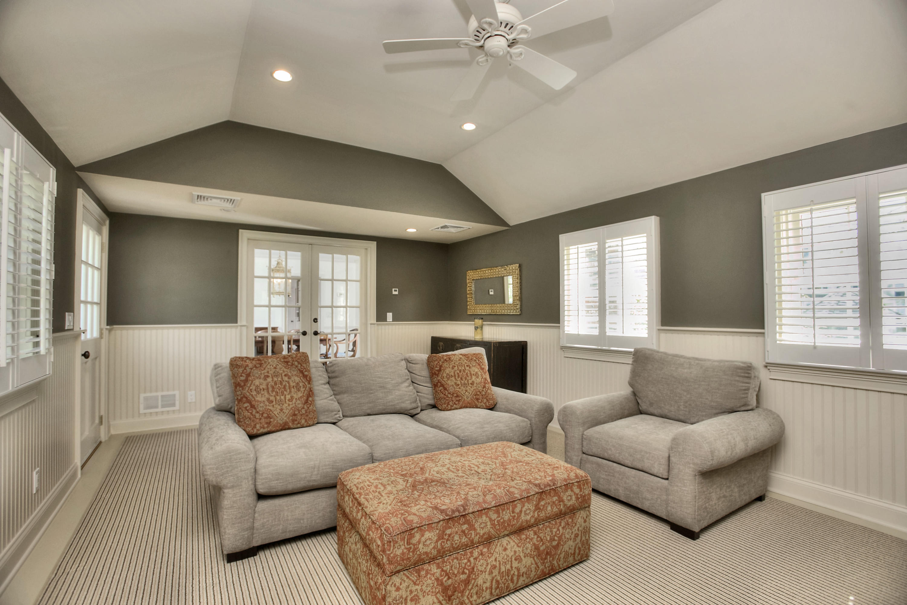 195 Ponus Ridge Road New Canaan, CT 06840 - Photo 8 of 28 a living room with furniture and a large window