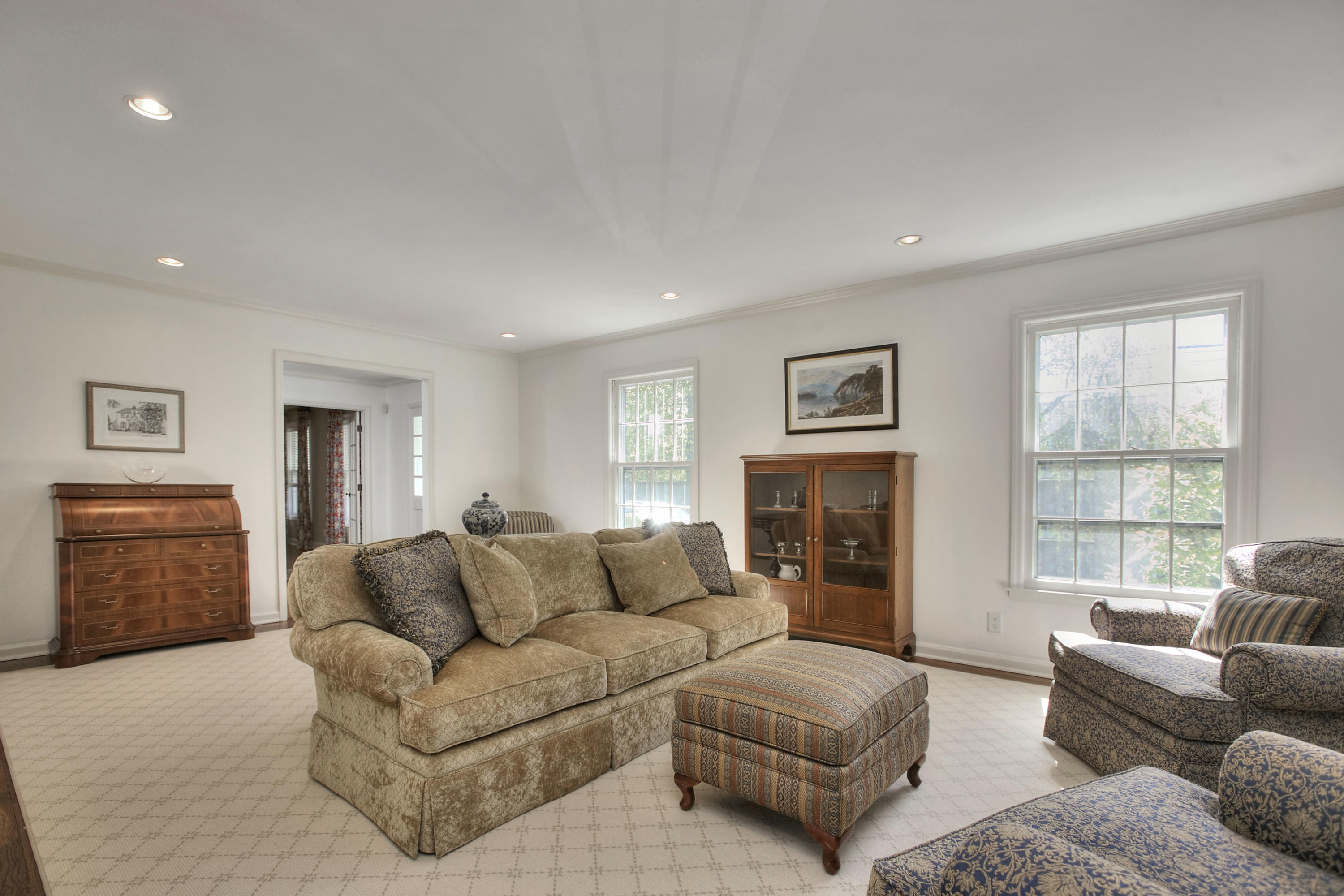 195 Ponus Ridge Road New Canaan, CT 06840 - Photo 10 of 28 a living room with furniture and a window