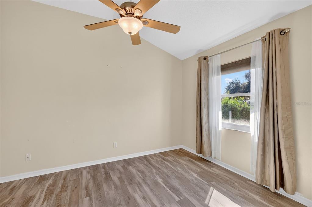 5500 Laver Street Leesburg, FL 34748 - Photo 17 of 35 wooden floor in an empty room