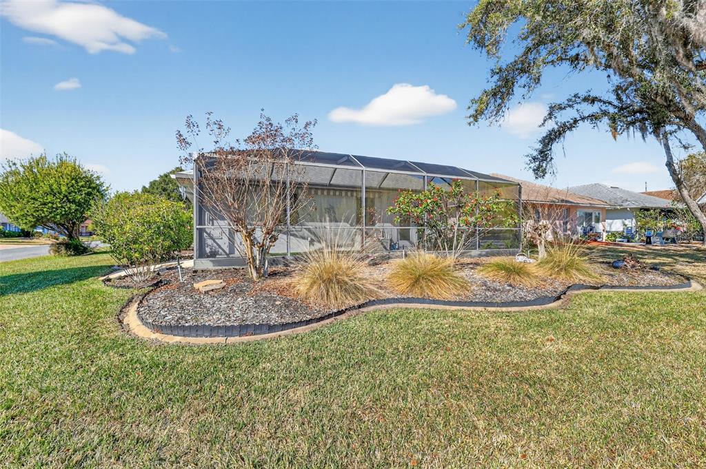 5500 Laver Street Leesburg, FL 34748 - Photo 22 of 35 a view of a swimming pool with a yard