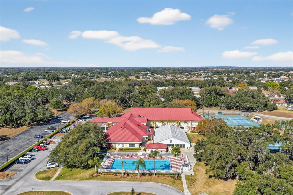 5500 Laver Street Leesburg, FL 34748 - Photo 24 of 35 an aerial view of residential houses with outdoor space and ocean view