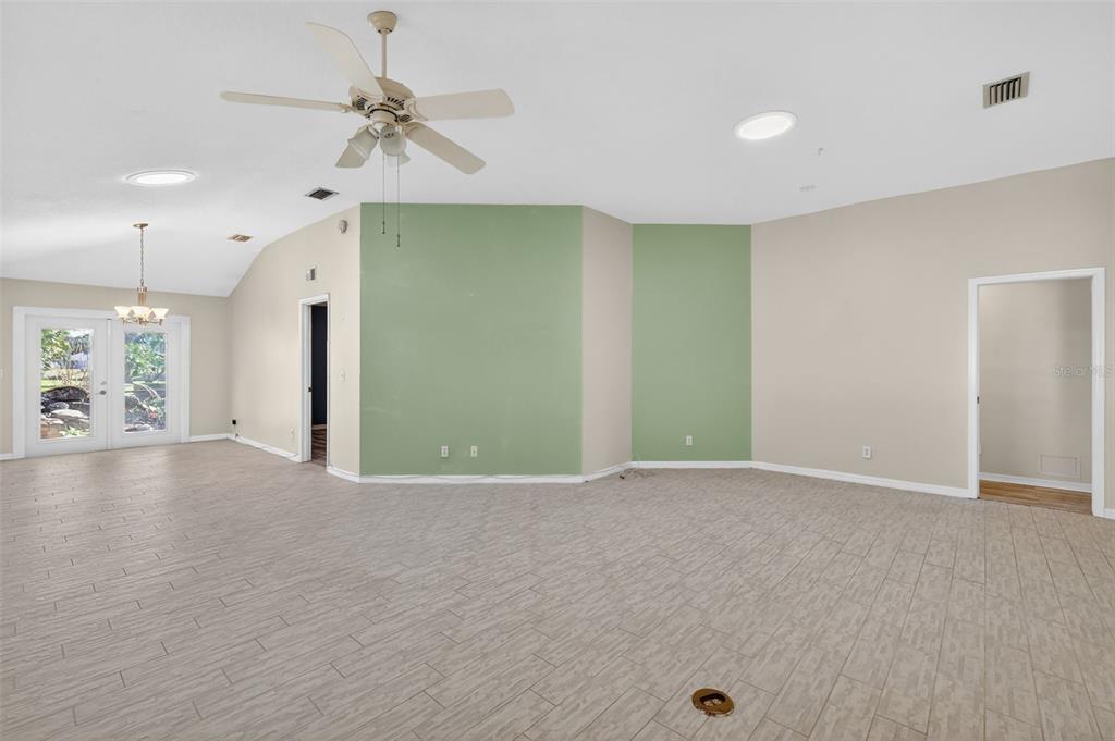 5500 Laver Street Leesburg, FL 34748 - Photo 6 of 35 a view of an empty room with a window