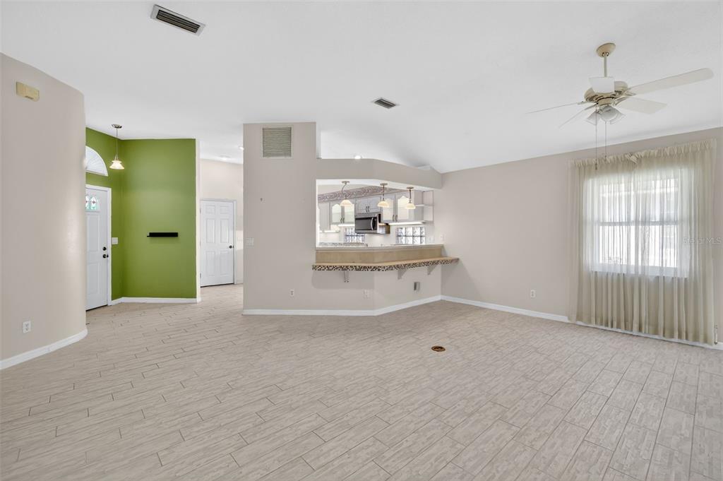 5500 Laver Street Leesburg, FL 34748 - Photo 8 of 35 a view of an empty room with a window