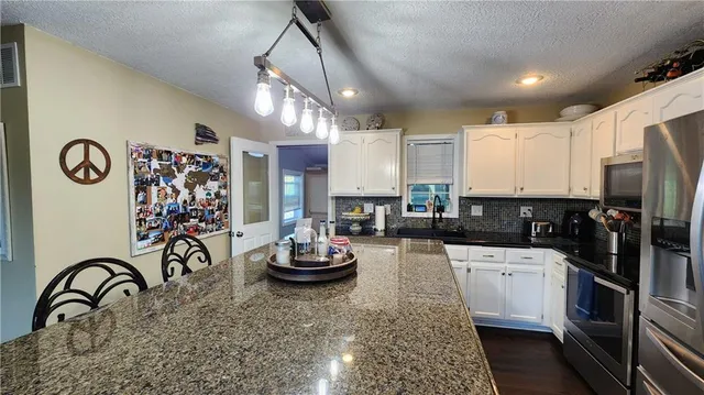 $510,000 | 201 Southeast Johnson Street, Lee's Summit, MO 64063