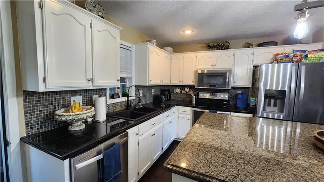 $510,000 | 201 Southeast Johnson Street, Lee's Summit, MO 64063