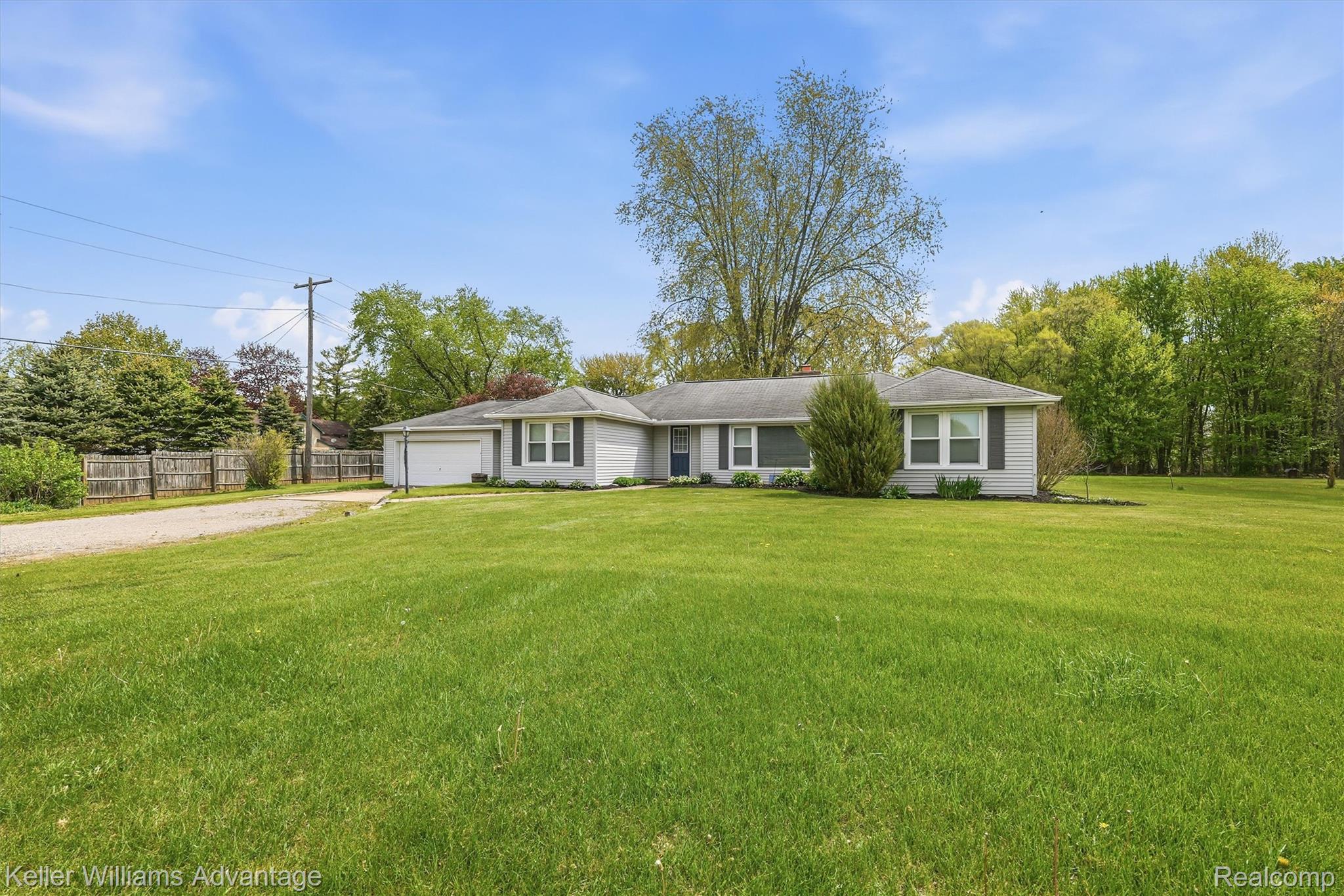 6595 Bray Road Vassar, MI 48768 - Photo 6 of 64 Single story home featuring driveway and an attached garage