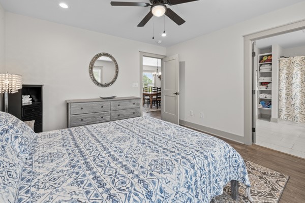 611 South Walnut Street Seneca, SC 29678 - Photo 12 of 31 This peaceful primary provides a comfortable space for relaxation, featuring convenient access to an adjacent ensuite.