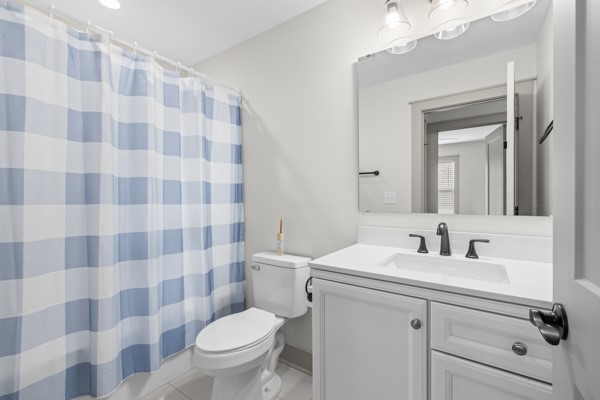 611 South Walnut Street Seneca, SC 29678 - Photo 17 of 31 This bright bathroom offers a clean vanity with a large mirror and classic fixtures.