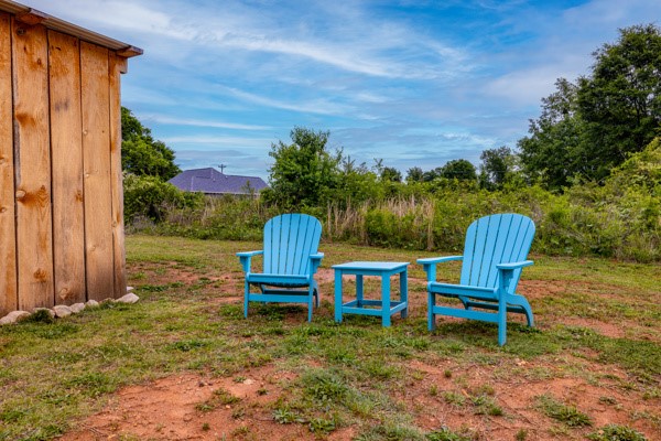 611 South Walnut Street Seneca, SC 29678 - Photo 23 of 31 This tranquil outdoor space offers a peaceful setting for relaxation amidst natural surroundings.