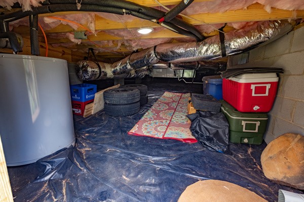 611 South Walnut Street Seneca, SC 29678 - Photo 24 of 31 This ample well-lit crawl space offers practical solutions for a good-sized dry storage area.
