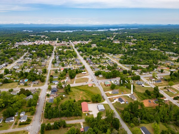 611 South Walnut Street Seneca, SC 29678 - Photo 30 of 31 An aerial perspective reveals a serene neighborhood nestled amidst verdant landscapes.