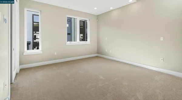 an empty room with windows