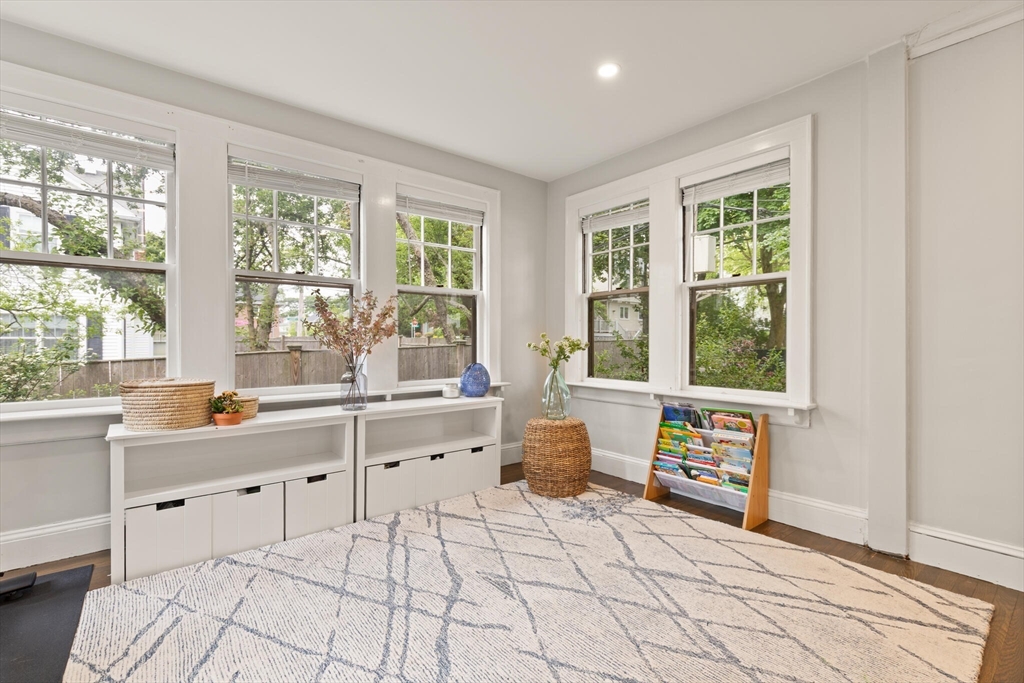 61 Howitt Road Boston, MA 02132 - Photo 11 of 42 a large white room with a large window